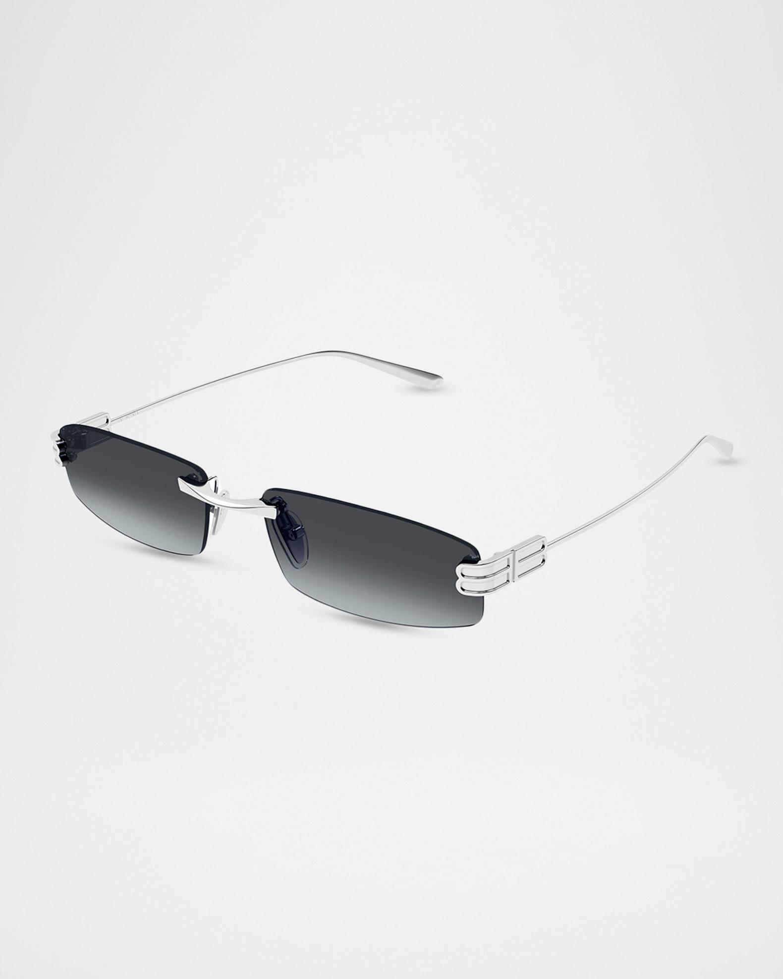 Balenciaga Shield Mask Rimless Sunglasses with Black Lenses and White Accents Balenciaga Gray Shield Unisex Sunglasses BB0003S 001 99 at  main image 3