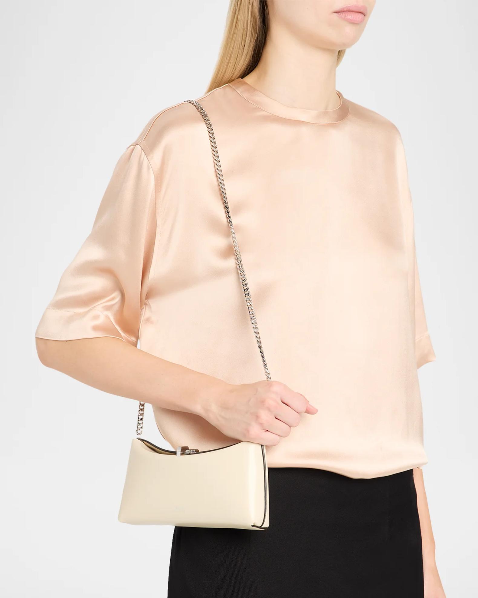 Toteme T-Lock Small Leather Clutch Bag | Neiman Marcus