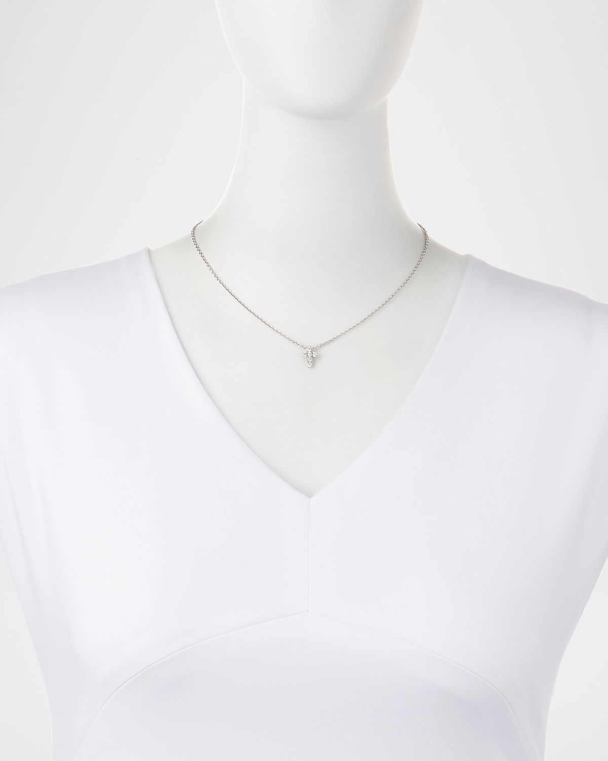 Fantasia by DeSerio 0.30 TCW Small CZ Cross Pendant Necklace