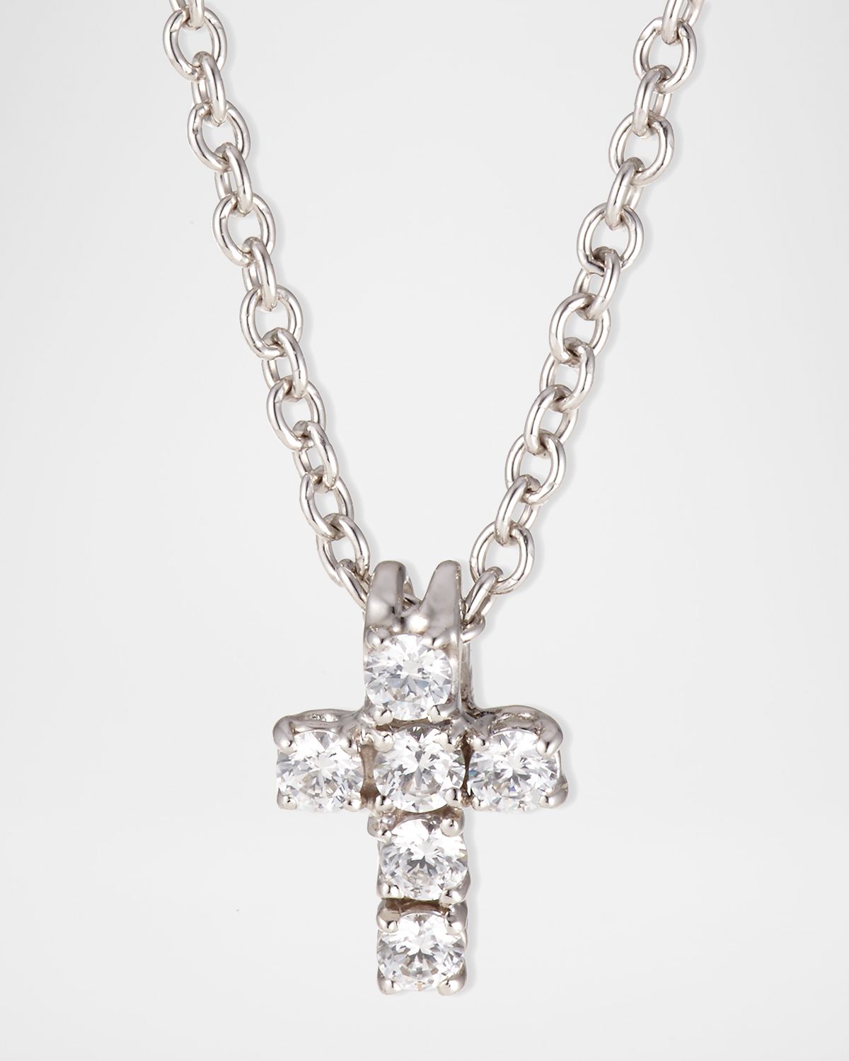 Fantasia by DeSerio 0.30 TCW Small CZ Cross Pendant Necklace