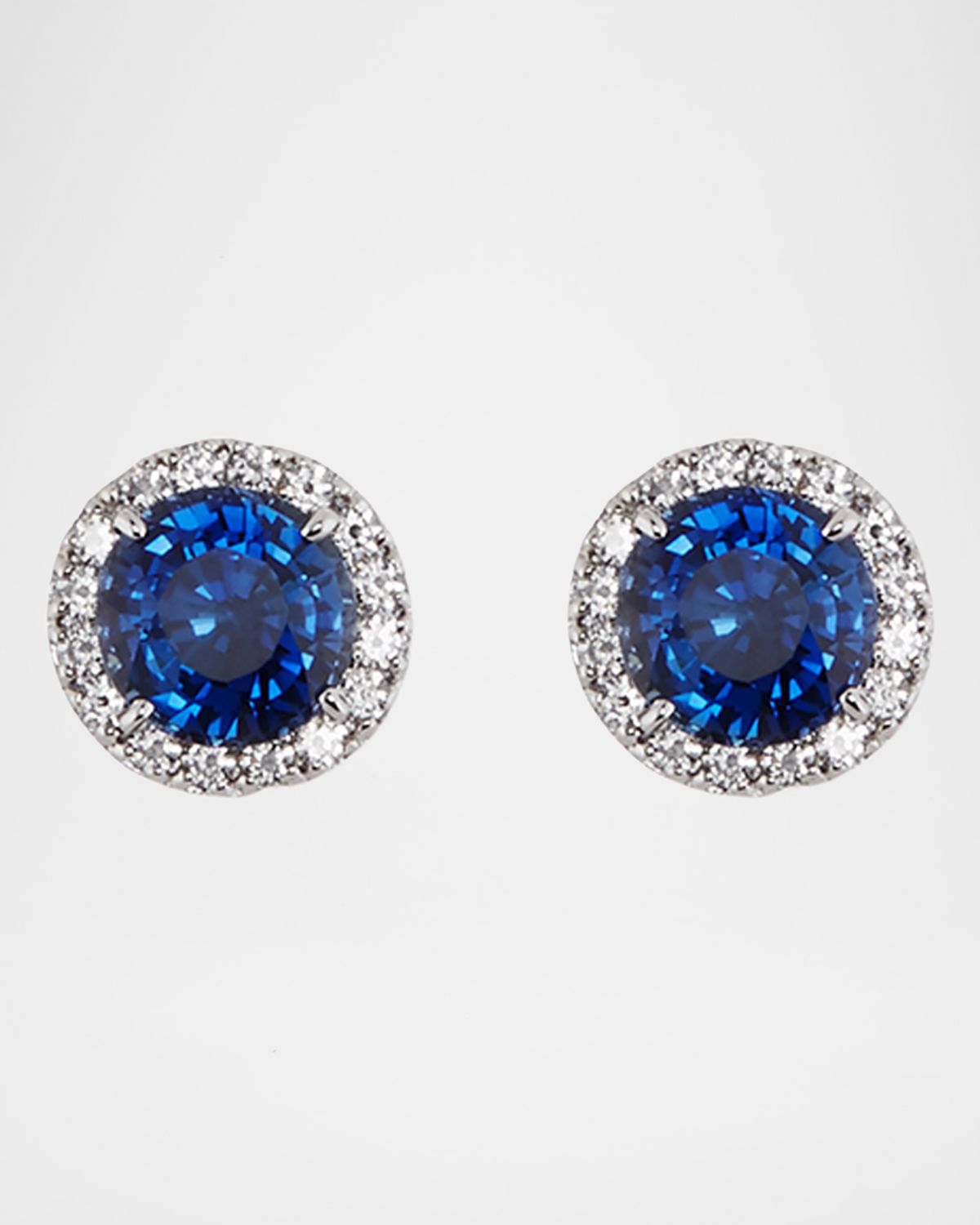 Fantasia by DeSerio Blue & White CZ Round Halo Stud Earrings