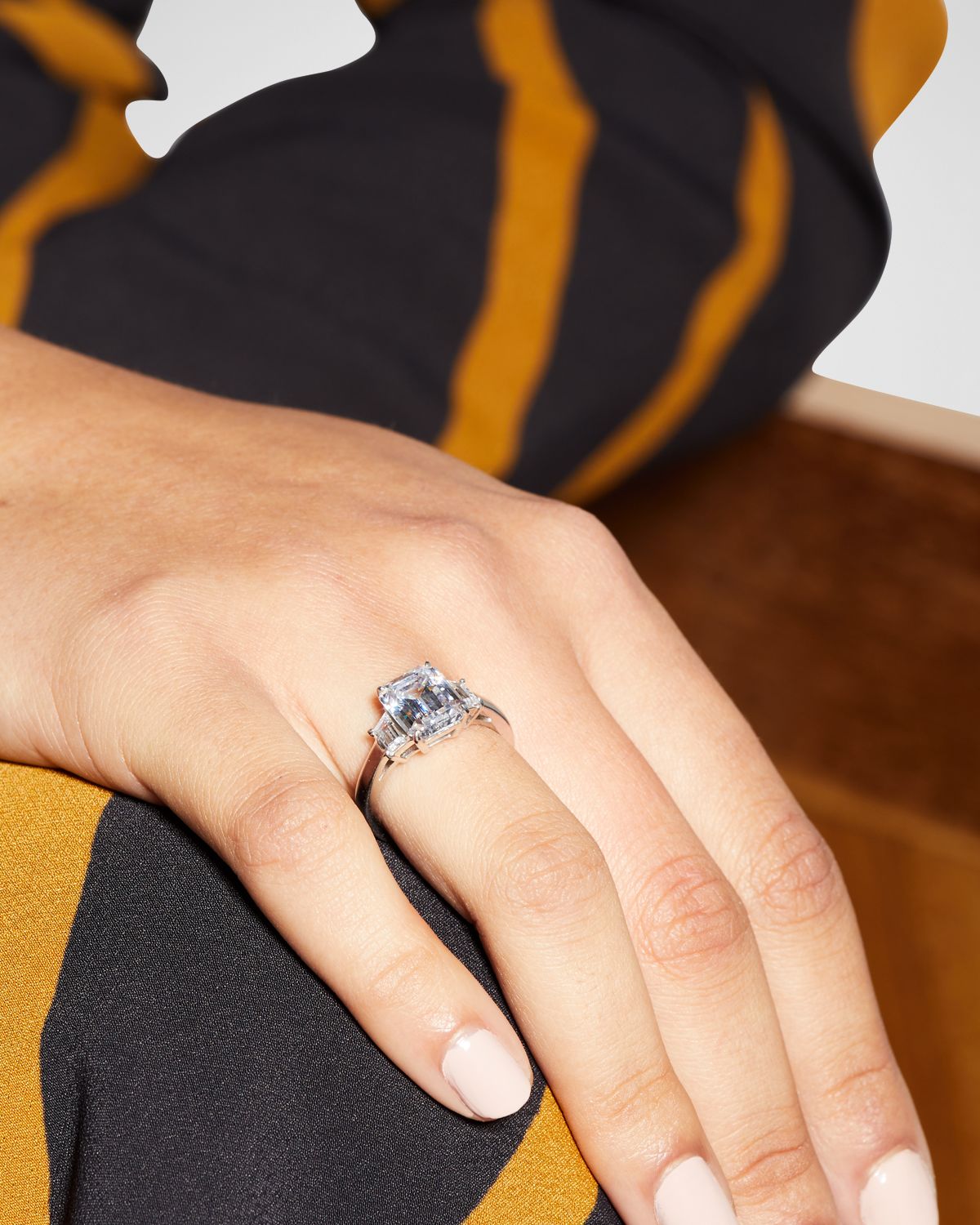 Fantasia by DeSerio Emerald-Cut Center with Trapezoid Sides Ring, Clear