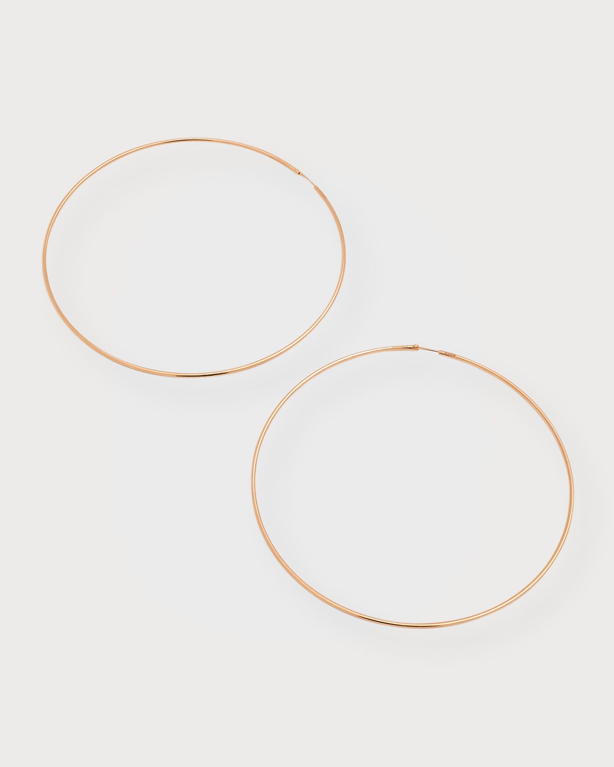 GINETTE NY Jumbo Circle Rose Gold Hoop Earrings