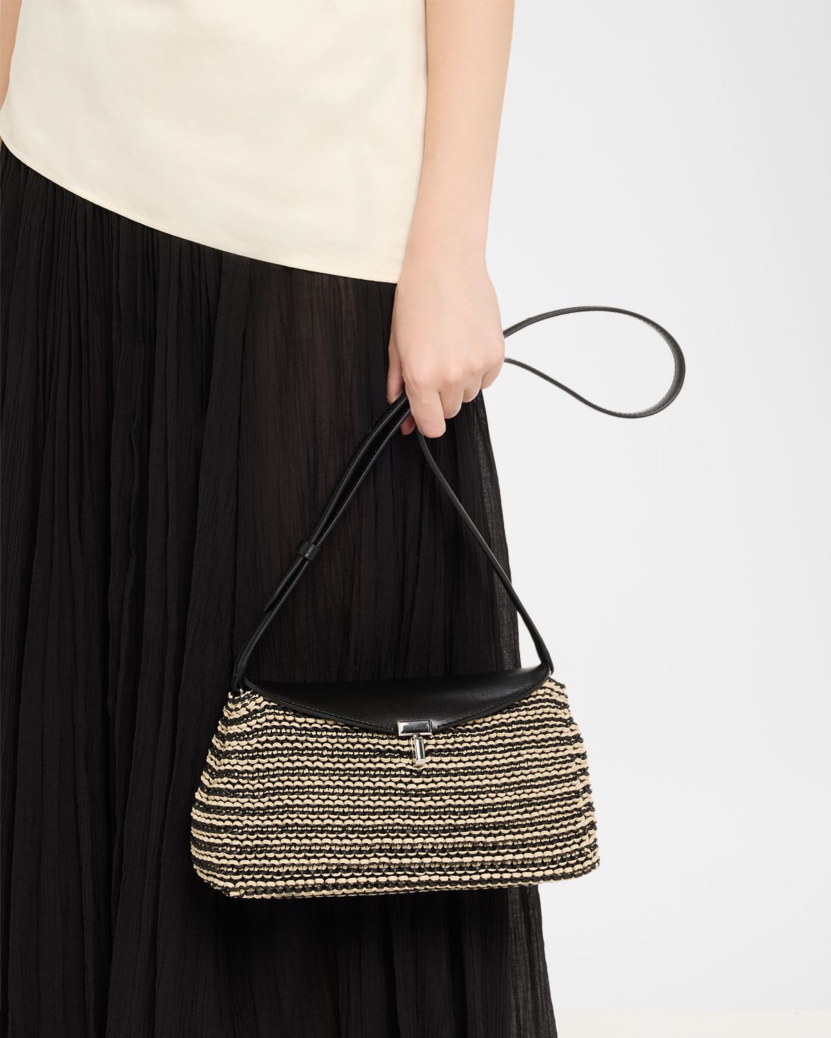 Toteme T-Lock Woven Leather Clutch Bag