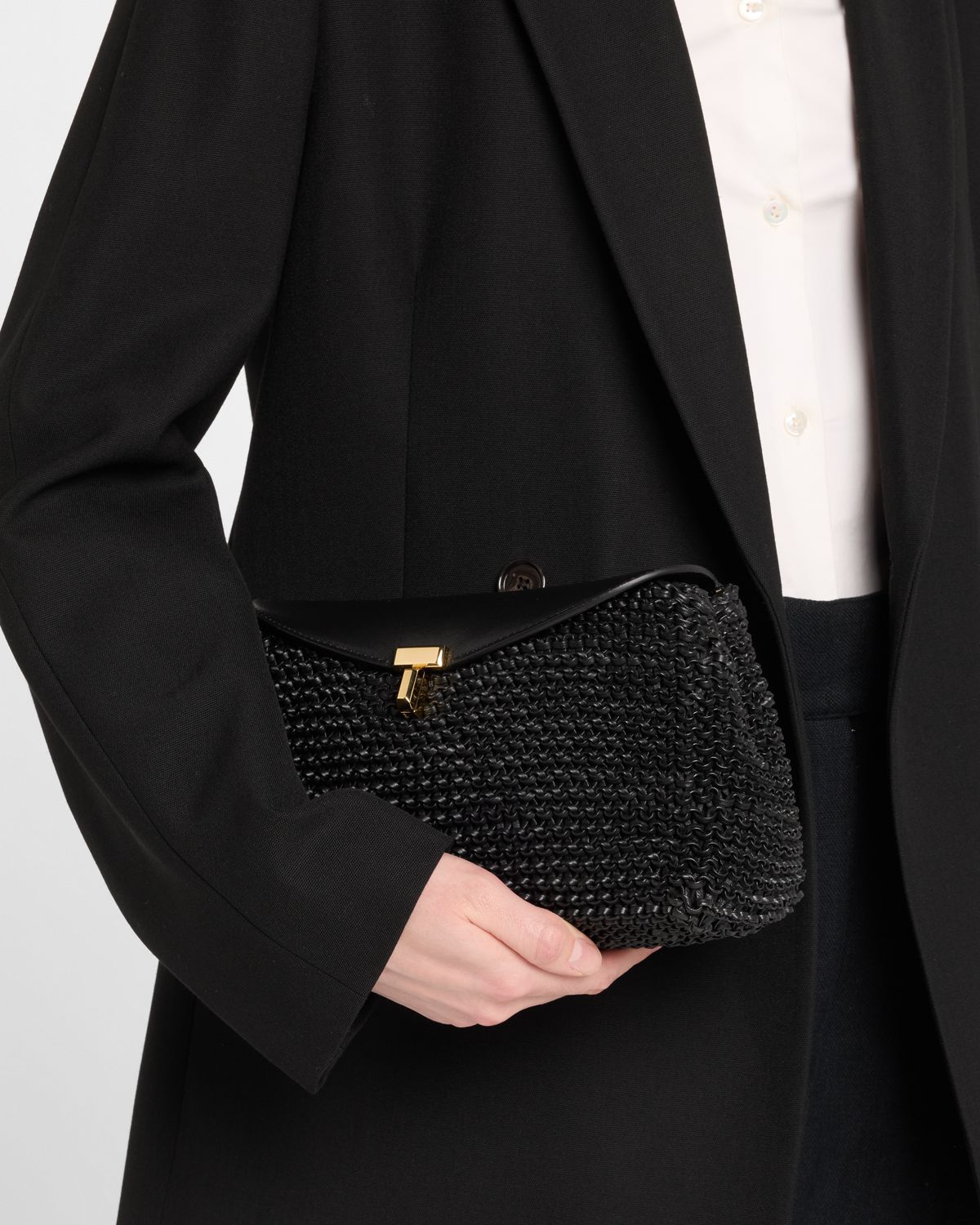 Toteme T-Lock Woven Leather Clutch Bag