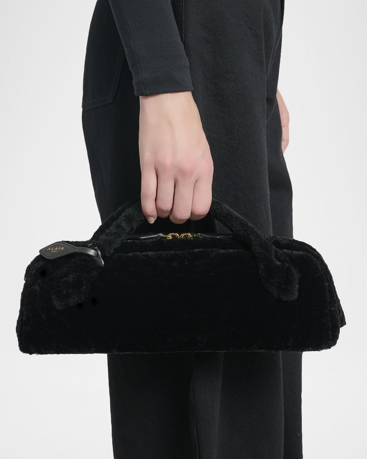ALAIA Le Teckel Shearling Clutch